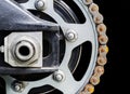 Motorcycle sprocket with rusty chain isolated on black blackground Royalty Free Stock Photo