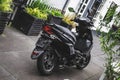 Motorcycle Sym Orbit 3 in garden Royalty Free Stock Photo