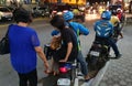 Motorcycle Taxi Transports Passengers Outside Mall in Cebu City, Philippines