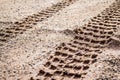 Motorcycle tire track print on sand Royalty Free Stock Photo