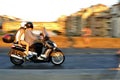 Motorcycle in traffic in Florence city in Italy