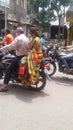 Motorcycle traffic - Indian old man with his wife on riding, Solapur