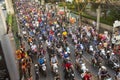 Motorcycle traffic jam in city centre during celebrate football fans winning AFF Suzuki Cup 2014. Royalty Free Stock Photo