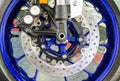 Motorcycle wheel details with brake and wheel spoke Royalty Free Stock Photo