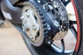 Motorcycle wheel and drive-chain and brake