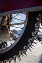 Spikes on a motorcycle wheel on an ice Speedway