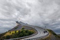 Motorcycles and cars going over the Storseisundbrua bridge Norway on a stormy day. Royalty Free Stock Photo