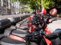 Motorcycles of the company Acciona Motosharing parked on a street in Madrid due to a temporary stoppage of the mobility service Royalty Free Stock Photo