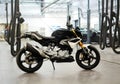 Motorcycles on the floor with workshop tools, a modern garage, storage and repair. This bike will be perfect. repairing a