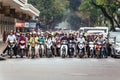 Motorcycles got traffic jam on the road with green trees in background at Hanoi, Vietnam Royalty Free Stock Photo