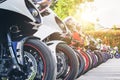 Motorcycles group parking on city street in summer Royalty Free Stock Photo