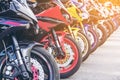 Motorcycles group parking on city street in summer Royalty Free Stock Photo