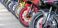 Motorcycles group parking on city street in summer Royalty Free Stock Photo