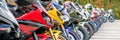 Motorcycles group parking on city street in summer Royalty Free Stock Photo
