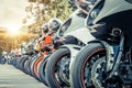 Motorcycles group parking on city street in summer Royalty Free Stock Photo