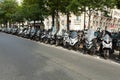 Motorcycles and mopeds in the street Parking on a Sunny summer day in Paris France may 2018