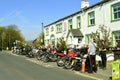 Motorcycles parked outside a pub