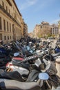 Motorcycles parking in a public square