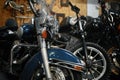 Motorcycles range in garage shop, repaired motorbikes ready for selling