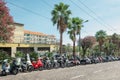 Motorcycles, scooters and mopeds parked on the via Bartolomeo Asquasciati in the center of the Italian town San Remo