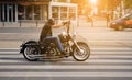 Biker riding on classical chopper, sunset Royalty Free Stock Photo