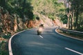 Motorcyclist on mountainous road, enjoying tour along Mallorca, summertime activities, wonderful mountain landscape, extreme Royalty Free Stock Photo