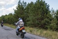 Motorcyclist biker driving on the highway