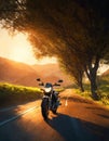 Motorcyclist riding a motorcycle on a country road at sunset. ai generative Royalty Free Stock Photo