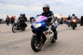 Motorcyclists on Cool Motorbikes, in helmets and leather jackets, open the motorcycle season, Motorcycling in Motorcycle Racing