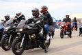Motorcyclists on Cool Motorbikes, in helmets and leather jackets, open the motorcycle season, Motorcycling in Motorcycle Racing Royalty Free Stock Photo