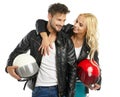 Motorcyclists couple with helmets