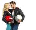 Motorcyclists couple with helmets