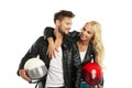 Motorcyclists couple with helmets in hand Royalty Free Stock Photo