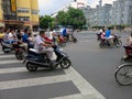 Motorcyclists Crossing the Street