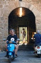Motorcyclists at the gates of ancient Rhodes city