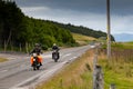 Motorcyclists touring on vintage motorbikes 