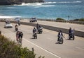 Motorcyclists in vintage clothing driving up Pacific Coast Highway for the Distinguished Gentlemens Ride