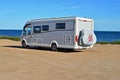 A Motorhome Camper Van Parked On A Beach