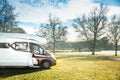 motorhome on a camping ground, caravan vacations, campervan trip