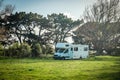 motorhome on a camping ground, caravan vacations, campervan trip