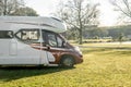 motorhome on a camping ground, caravan vacations, campervan trip