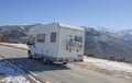 Motorhome climbing slowly by mountains pass