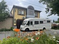 Motorhome in front of a house Royalty Free Stock Photo