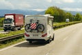 Motorhome - HAMER, moving along the motorway. Travel concept.