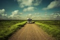 Motorhome on off road in dune landscape