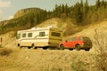 A motorhome traveling along the top of the world highway