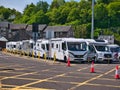 Motorhomes queue at the CalMac ferry terminal in Oban, Scotland, UK for the ferry to Castlebay on Barra in the Outer Hebrides Royalty Free Stock Photo