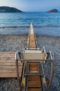 Motorized chair that helps disabled people swim Royalty Free Stock Photo