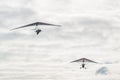 Motorized hang glider tows another wing Royalty Free Stock Photo