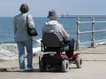 Motorized wheelchair user Royalty Free Stock Photo